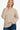 Front view of model in Round Neck Long Sleeve Curved Hem Sweater, showcasing the comfortable fit.