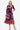 Paisley Print Lace Ruffled Midi Dress front view on model, showcasing the vibrant paisley print and lace details.