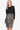 Women's color-block knit dress with black top and leopard print skirt, shown from the front.