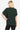 Back view of the Women's Lurex Center Elastic Cinched Knit Top showing the comfortable fit and sleek design.