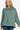 Model wearing Women's Scuba Round Neck Side Slit Sweatshirt in Ash Jade.